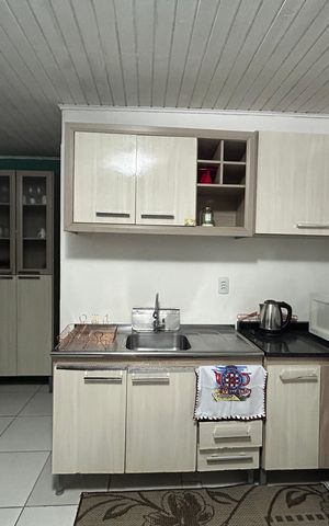 Casa à venda com 130m², 3 quartos e sem vaga Casa à venda com 130m², 3 quartos e sem vagaCozinha