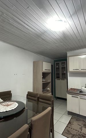 Casa à venda com 130m², 3 quartos e sem vaga Casa à venda com 130m², 3 quartos e sem vagaCozinha