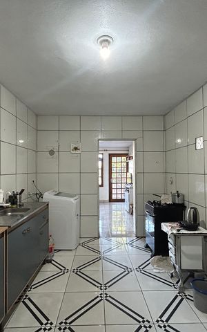 Casa à venda com 130m², 3 quartos e sem vaga Casa à venda com 130m², 3 quartos e sem vagaCozinha