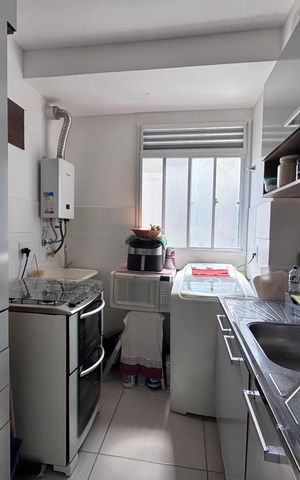 Apartamento à venda com 44m², 2 quartos e 1 vaga Apartamento à venda com 44m², 2 quartos e 1 vagaCozinha e Área de Serviço