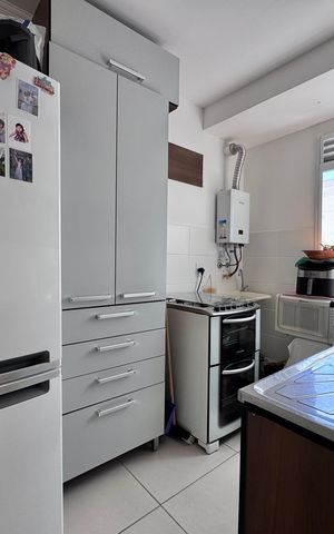 Apartamento à venda com 44m², 2 quartos e 1 vaga Apartamento à venda com 44m², 2 quartos e 1 vagaCozinha e Área de Serviço