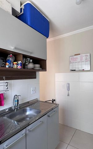 Apartamento à venda com 44m², 2 quartos e 1 vaga Apartamento à venda com 44m², 2 quartos e 1 vagaCozinha e Área de Serviço