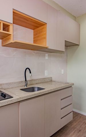 Apartamento à venda com 50m², 1 quarto e 1 vaga Apartamento à venda com 50m², 1 quarto e 1 vagaCozinha e Área de Serviço
