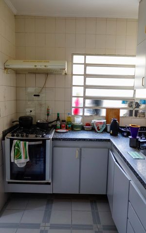 Casa à venda com 150m², 3 quartos e 3 vagas Casa à venda com 150m², 3 quartos e 3 vagasCozinha