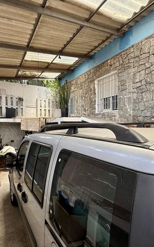 Casa à venda com 200m², 6 quartos e 1 vaga Casa à venda com 200m², 6 quartos e 1 vagaGaragem
