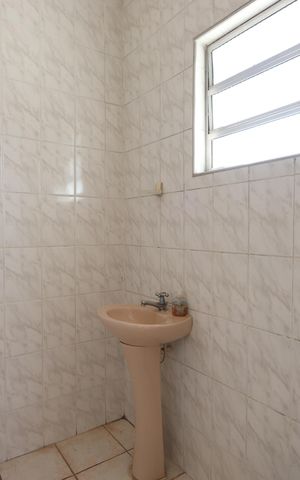 Casa à venda com 250m², 6 quartos e 3 vagasBanheiro do Quintal