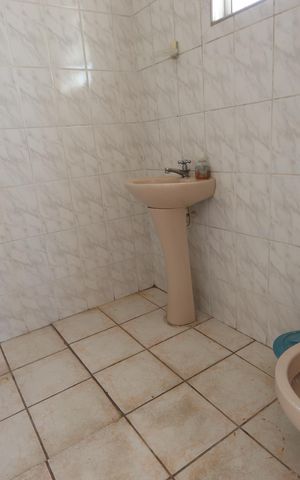 Casa à venda com 250m², 6 quartos e 3 vagasBanheiro do Quintal