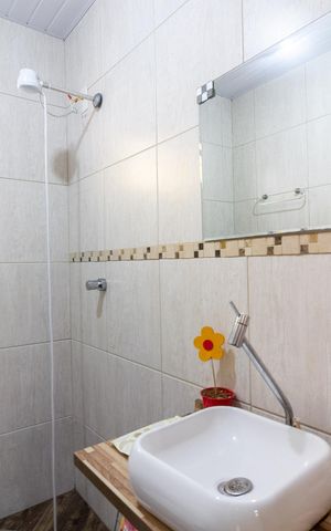 Casa à venda com 151m², 2 quartos e 2 vagasBanheiro Social