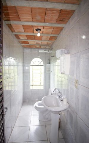 Casa à venda com 1260m², 4 quartos e 4 vagas Casa à venda com 1260m², 4 quartos e 4 vagasBanheiro do Terraço