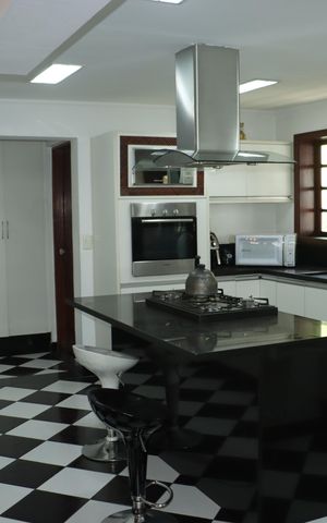 Casa de condomínio para alugar com 400m², 5 quartos e 4 vagasCozinha