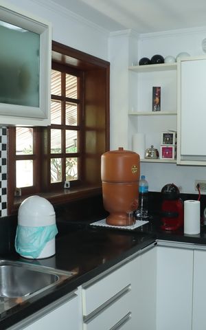Casa de condomínio para alugar com 400m², 5 quartos e 4 vagasCozinha