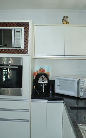 Casa de condomínio para alugar com 400m², 5 quartos e 4 vagasCozinha
