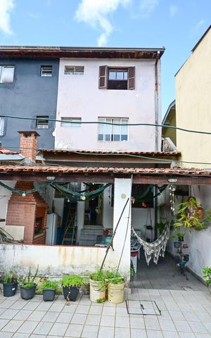 Casa à venda com 146m², 3 quartos e 2 vagasFachada Posterior