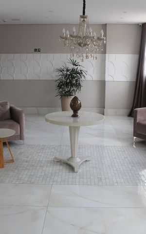 Apartamento à venda com 60m², 2 quartos e 2 vagasHall social