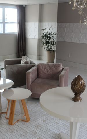 Apartamento à venda com 60m², 2 quartos e 2 vagasHall social