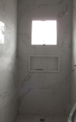 Casa à venda com 140m², 3 quartos e 4 vagasBanheiro da Suíte 1