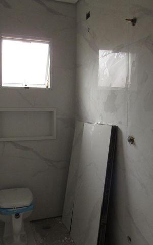 Casa à venda com 140m², 3 quartos e 4 vagasBanheiro da Suíte 3