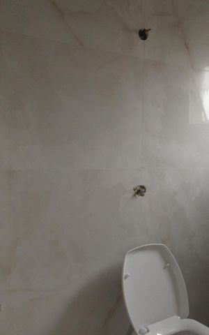 Casa à venda com 140m², 3 quartos e 4 vagasBanheiro da Suíte 2