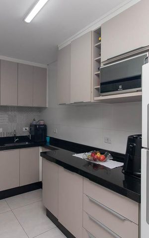 Casa de condomínio à venda com 55m², 2 quartos e 2 vagas Casa de condomínio à venda com 55m², 2 quartos e 2 vagasCozinha