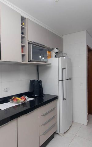 Casa de condomínio à venda com 55m², 2 quartos e 2 vagas Casa de condomínio à venda com 55m², 2 quartos e 2 vagasCozinha