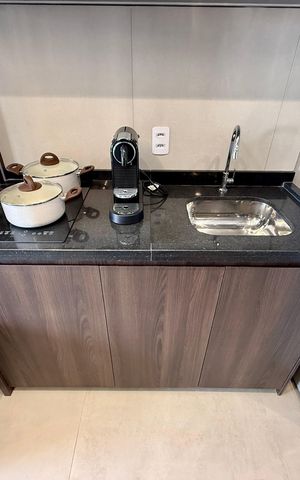 Studio à venda com 27m², 1 quarto e sem vagaCozinha 