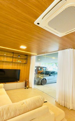 Casa de condomínio à venda com 385m², 4 quartos e 4 vagas Casa de condomínio à venda com 385m², 4 quartos e 4 vagasSala