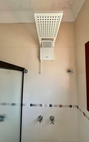 Casa de condomínio à venda com 265m², 4 quartos e 4 vagasBanheiro da Suíte 1