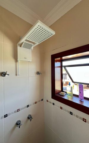 Casa de condomínio à venda com 265m², 4 quartos e 4 vagasBanheiro da Suíte