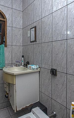 Casa à venda com 95m², 3 quartos e 2 vagas Casa à venda com 95m², 3 quartos e 2 vagasbanheiro social_2