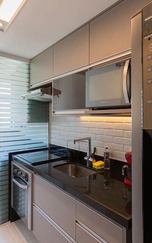 Apartamento à venda com 54m², 2 quartos e 1 vagaCozinha e Área de Serviço