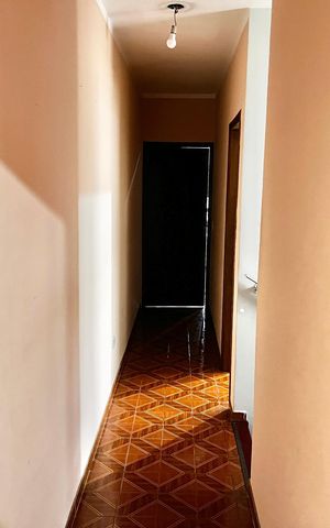 Casa à venda com 80m², 3 quartos e 2 vagasCorredor