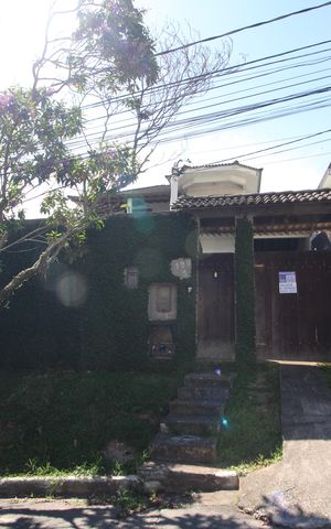 Casa de condomínio à venda com 206m², 4 quartos e 3 vagasFachada com Placa
