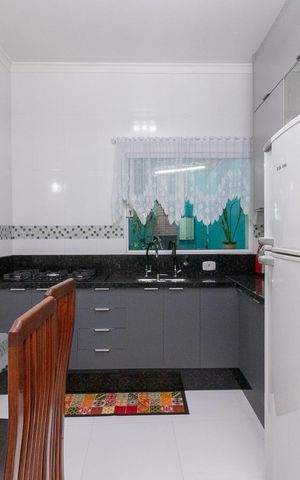 Casa para alugar com 100m², 3 quartos e 3 vagasCozinha