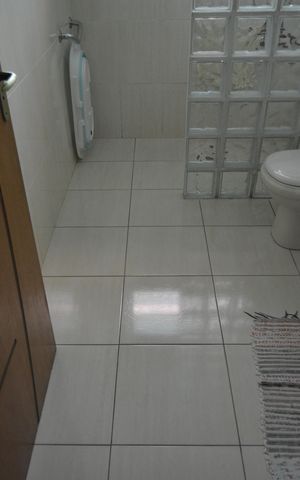 Casa à venda com 290m², 3 quartos e 3 vagasBanheiro da Suíte 2