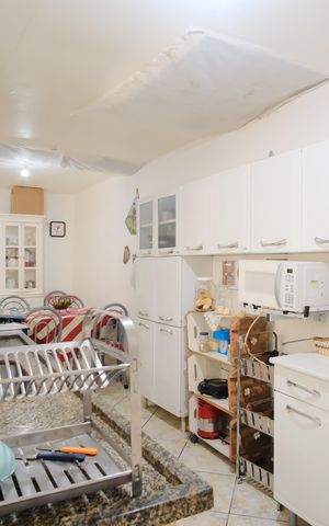 Casa à venda com 450m², 7 quartos e 6 vagasCozinha da Casa 1