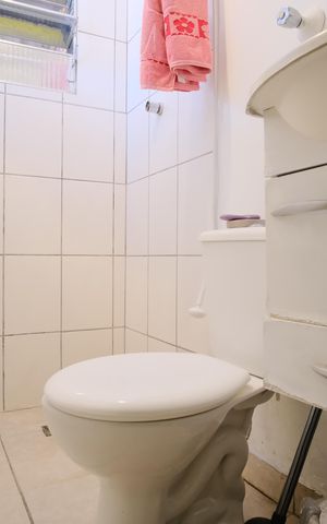 Casa à venda com 450m², 7 quartos e 6 vagasBanheiro da Suíte 2 da Casa 1