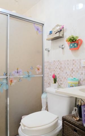 Casa à venda com 450m², 7 quartos e 6 vagasBanheiro da Suíte 1 da Casa 1