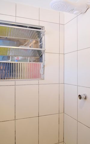 Casa à venda com 450m², 7 quartos e 6 vagasBanheiro da Suíte 2 da Casa 1