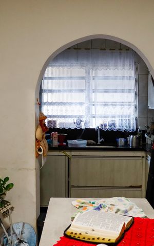 Casa à venda com 125m², 3 quartos e 2 vagas Casa à venda com 125m², 3 quartos e 2 vagasCozinha