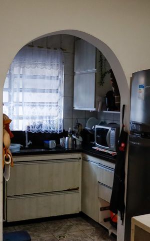 Casa à venda com 125m², 3 quartos e 2 vagas Casa à venda com 125m², 3 quartos e 2 vagasCozinha
