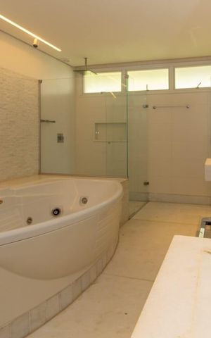 Casa de condomínio à venda com 397m², 4 quartos e 5 vagas