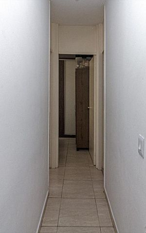 Apartamento à venda com 47m², 2 quartos e 1 vaga Apartamento à venda com 47m², 2 quartos e 1 vagacorredor para os cômodos_1