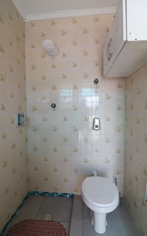 Casa à venda com 600m², 3 quartos e 4 vagasBanheiro de serviço