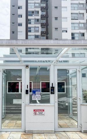 Apartamento à venda com 86m², 2 quartos e 2 vagasFachada + plaquinha
