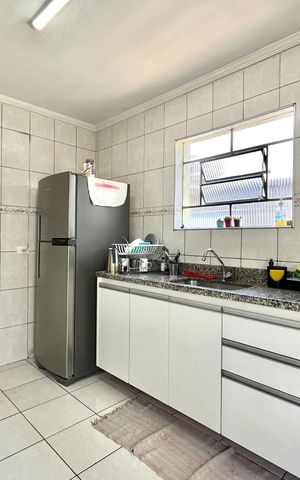 Casa à venda com 130m², 2 quartos e 2 vagas Casa à venda com 130m², 2 quartos e 2 vagasCozinha