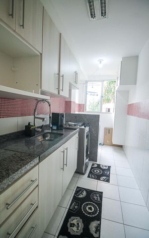 Apartamento à venda com 73m², 2 quartos e 1 vagaCozinha e Área de Serviço
