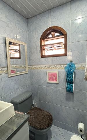 Casa à venda com 250m², 4 quartos e 5 vagasBanheiro casa 2