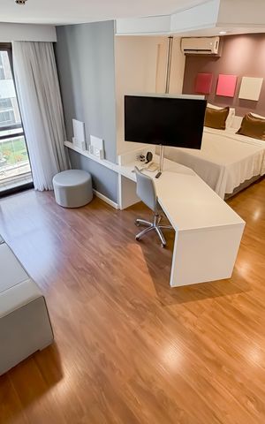 Studio à venda com 33m², 1 quarto e 1 vaga Studio à venda com 33m², 1 quarto e 1 vagaSala