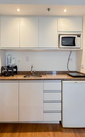 Studio à venda com 33m², 1 quarto e 1 vaga Studio à venda com 33m², 1 quarto e 1 vagaCozinha