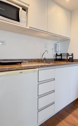 Studio à venda com 33m², 1 quarto e 1 vaga Studio à venda com 33m², 1 quarto e 1 vagaCozinha